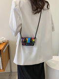 Front angle of black mini acrylic chain crossbody bag