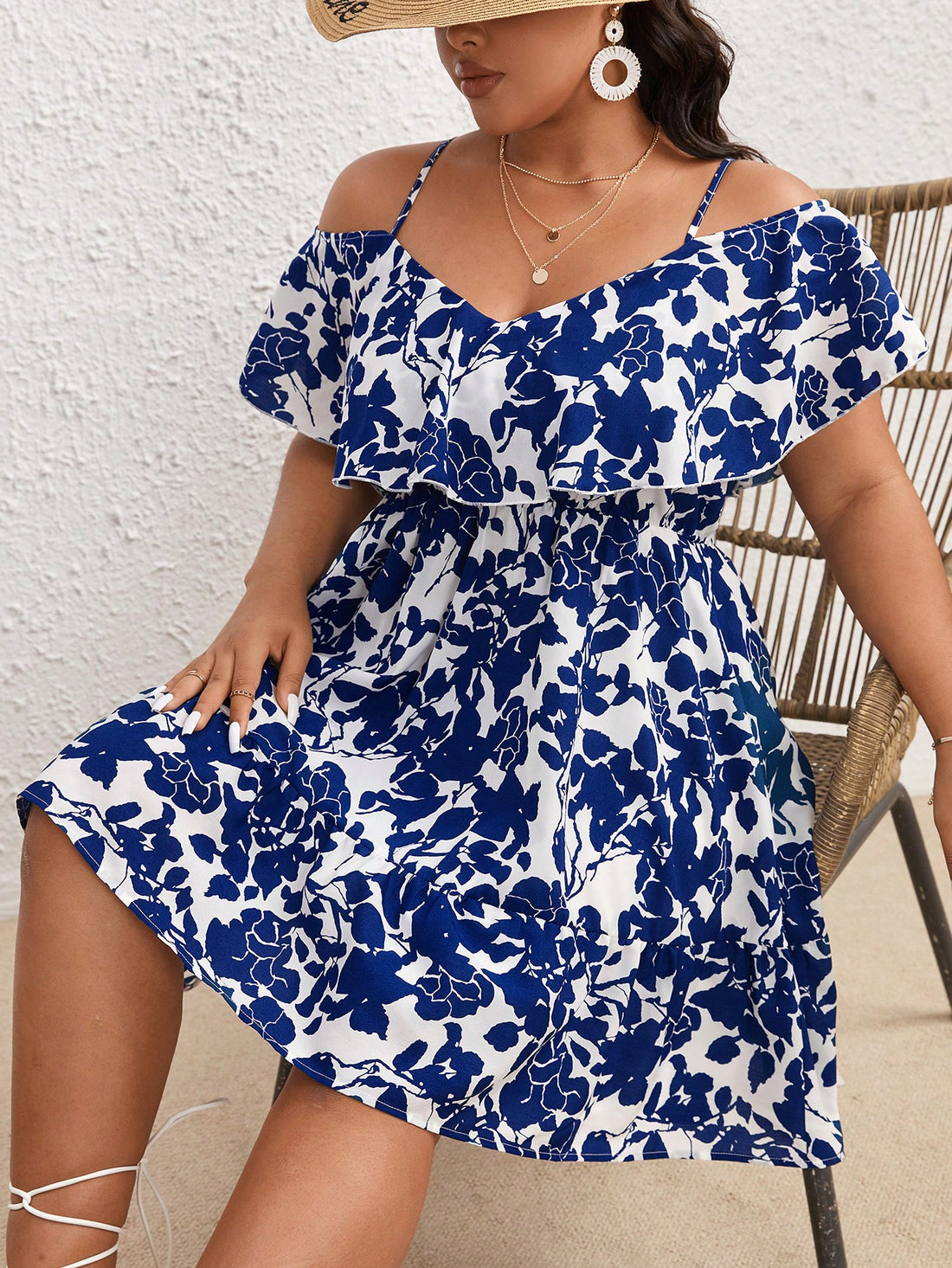 Effortlessly rock summer style with our Chic Plus Size Floral Print Cold Shoulder Dress! This trendy dress features a unique cold shoulder design and a beautiful floral print, making it perfect for any occasion. Stay stylish and comfortable all season long with this must-have dress.