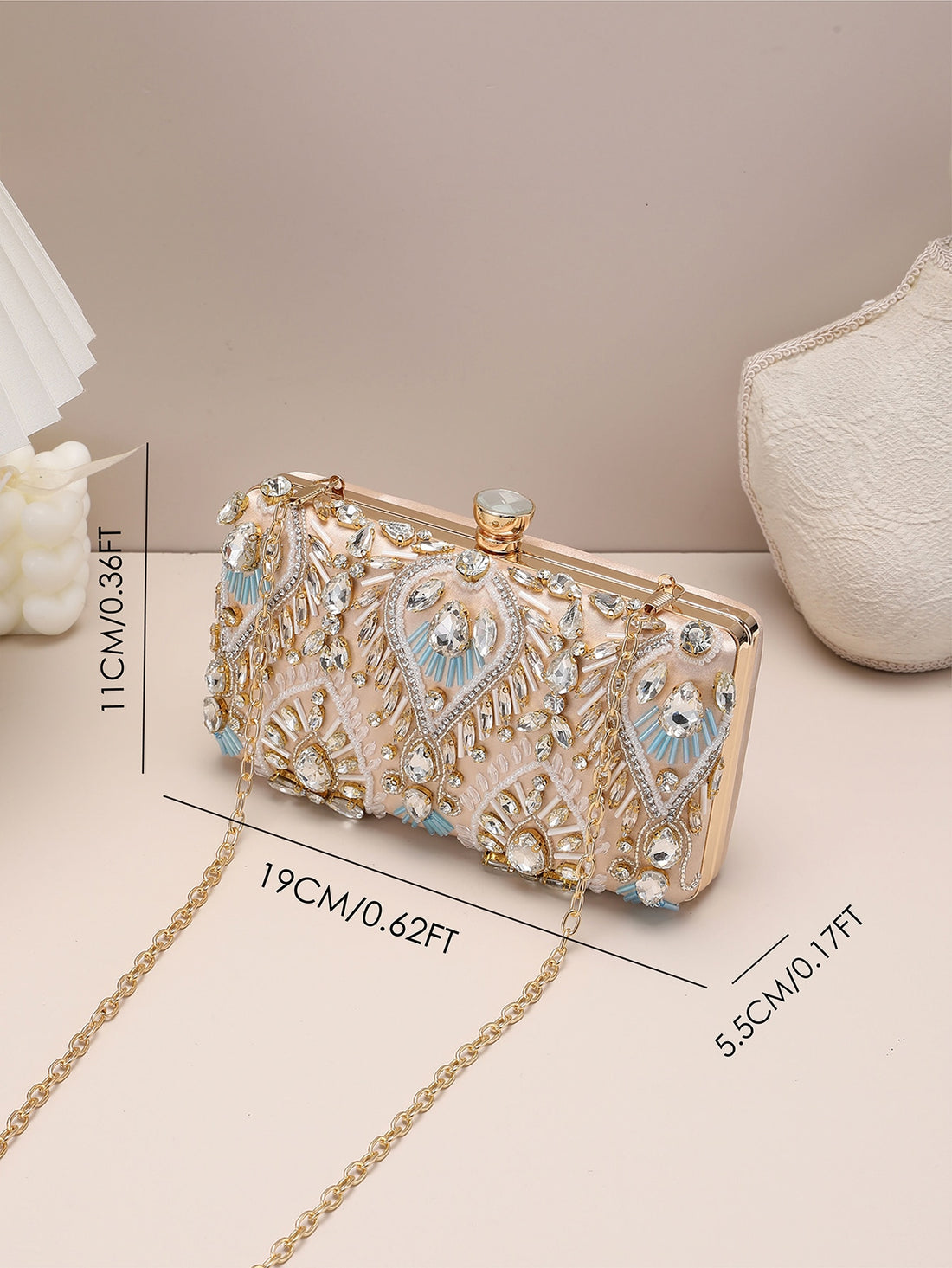 Add a touch of glamour to your outfit with our Sparkle & Shine Mini Rhinestone Clutch Bag. This elegant accessory is perfect for glamorous nights out. The mini size allows for maximum portability while the rhinestone design adds a touch of sparkle to any outfit. Elevate your style with this must-have accessory.