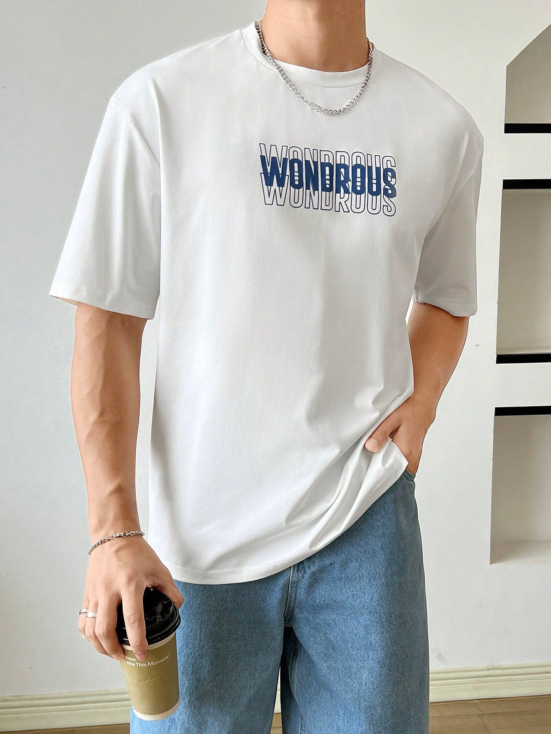 This Men's Baggy Crew Neck Slogan Tee is the epitome of casual Korean fashion for the summer. Made with high-quality knit fabric, this top offers a comfortable and loose fit. Its stylish slogan adds a touch of personality and creativity to any outfit. Elevate your wardrobe with this must-have piece.