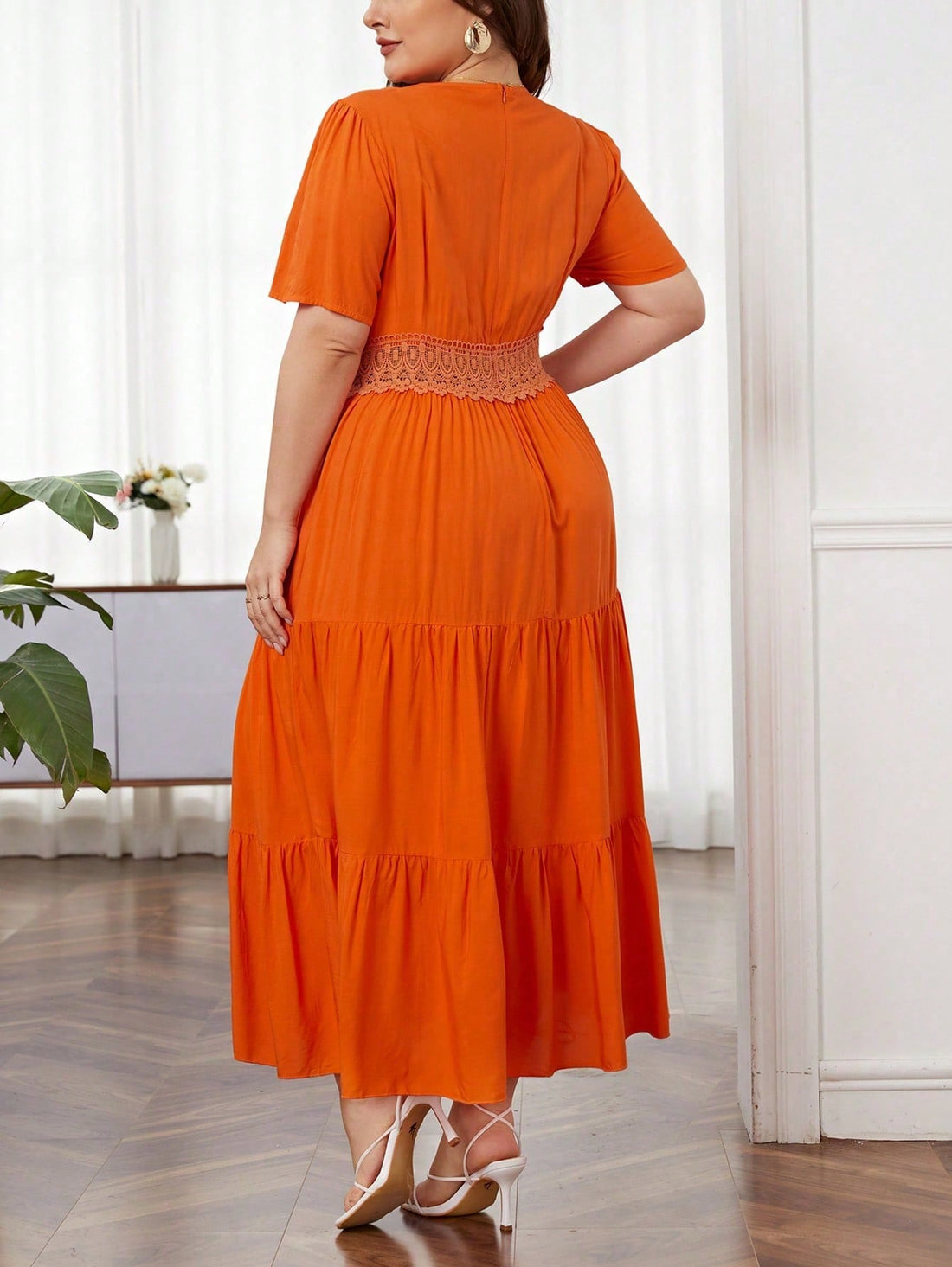 Get ready to effortlessly stun in this elegant plus size dress featuring delicate guipure lace inserts. The perfect combination of sophistication and style, this dress will have you feeling confident and chic. Dress up any occasion with this flawless piece. (Elevate your style game with ease!)