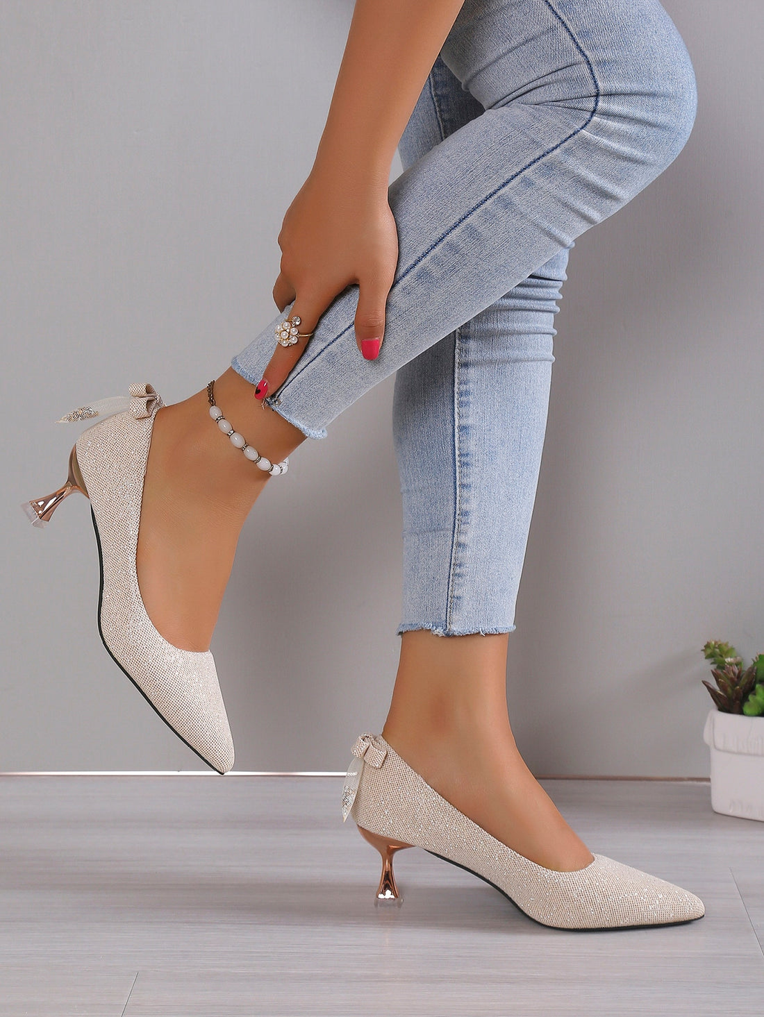 Exude glamour and sophistication on your special day with Glittering Elegance: Women's High Heel Wedding Shoes. The pointed toe and stiletto heels offer a timeless silhouette, while the glittering accents add a touch of luxury. Elevate your style and confidence with these stunning wedding shoes.