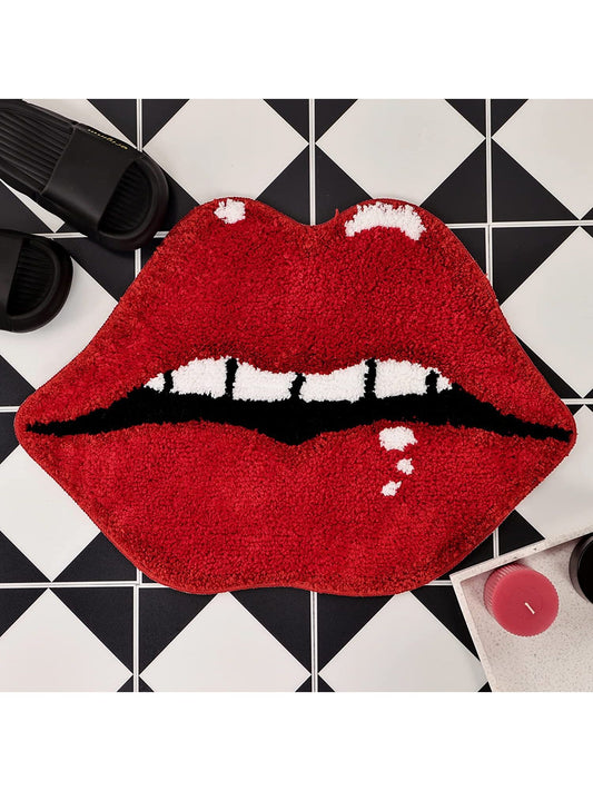 This Red Lips Printed Velvet Bathroom Set is the perfect addition to your bathroom. With an anti-slip <a href="https://canaryhouze.com/collections/rugs-and-mats?sort_by=created-descending" target="_blank" rel="noopener">mat, rug,</a> and pedestal mat, it provides safety and style. Made of soft, comfortable, and absorbent material, it will keep your feet dry and cozy. Plus, it's machine washable for easy maintenance.