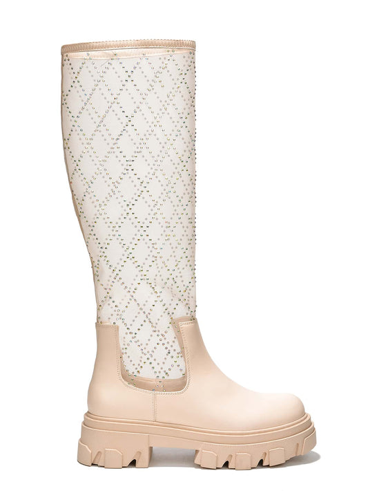 These Bold and Beautiful <a href="https://canaryhouze.com/collections/women-boots" target="_blank" rel="noopener">boots</a> feature a knee-high design with a mesh overlay, adding a touch of edginess to any outfit. The chunky lug sole provides stability and durability, making them perfect for daily wear. Elevate your style with these statement-making boots.