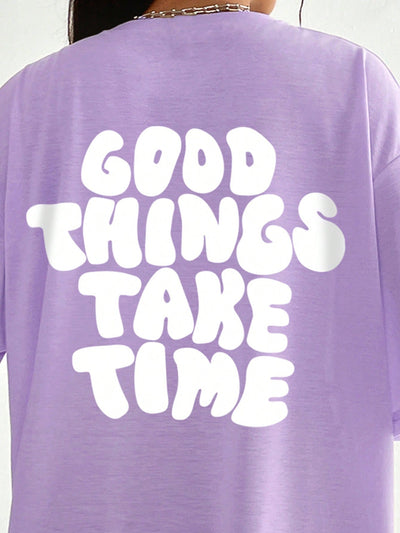 Stay Stylish and Comfy with the Slogan Graphic Drop Shoulder Tee