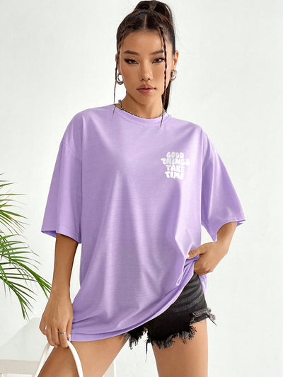 Stay Stylish and Comfy with the Slogan Graphic Drop Shoulder Tee