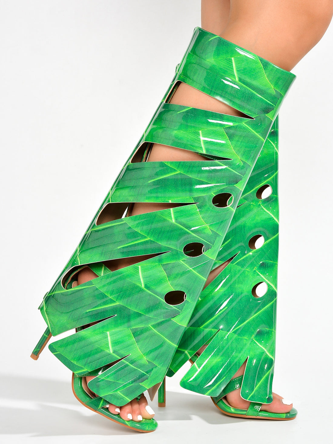 Elevate your style with our Leaf Round Toe High Heels, inspired by nature's elegance. Featuring a unique leaf design on the toe, these heels add a touch of sophistication to any outfit. Made with high-quality materials, you'll stand out with confidence and comfort.