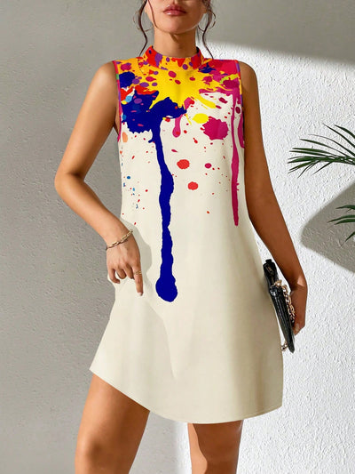 Stand out in style with the Bold and Beautiful: Splash Ink Print Mock Neck Dress. This vibrant dress features a unique splash ink print that will make a statement wherever you go. The mock neck adds a touch of elegance while the comfortable fit allows for easy movement. Perfect for any occasion, this dress is sure to turn heads.