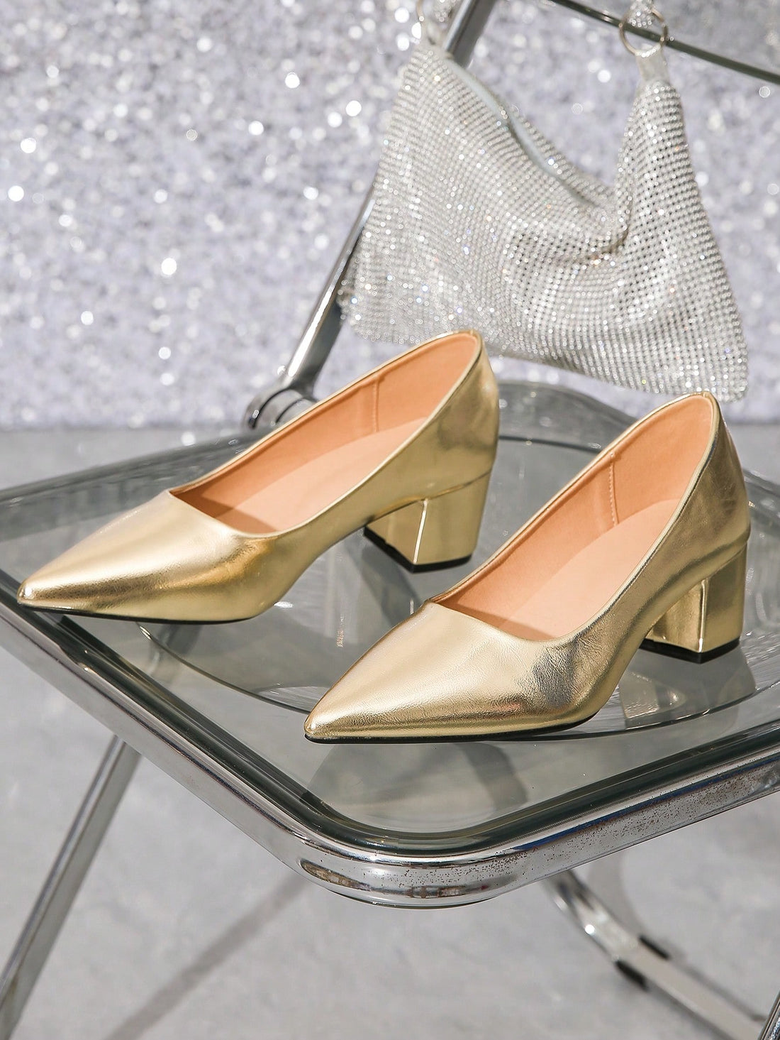 Elevate your spring and summer wardrobe with our Glamorous Gold High Heeled Sandals. Featuring a stunning gold design, these sandals will add a touch of glamour to any outfit. With a comfortable and stylish high heel, these sandals are perfect for any chic look. Don't miss out on this must-have accessory for the upcoming season.
