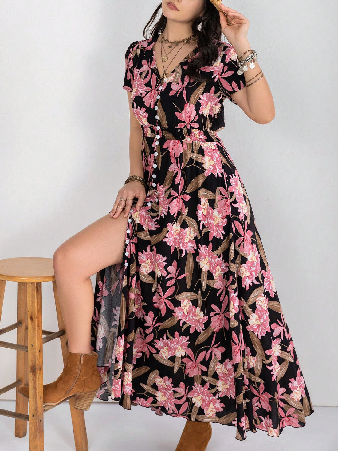 Elevate your bohemian style with our Floral Dream Print Split Thigh Dress. Embrace the chic side with this stylish and unique piece, featuring a delicate floral print and a split thigh design. Perfect for any occasion, this dress will make you stand out and exude confidence.
