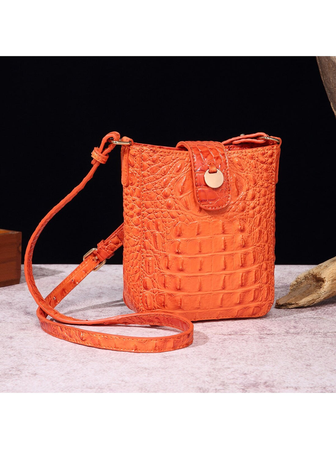 This vintage crocodile pattern crossbody bag is the perfect Valentine's Day gift for the stylish man in your life. Made with high-quality materials, it exudes luxury and sophistication. Its versatile design and spacious interior make it a practical and stylish choice for everyday use. Surprise your loved one with this timeless and elegant gift.