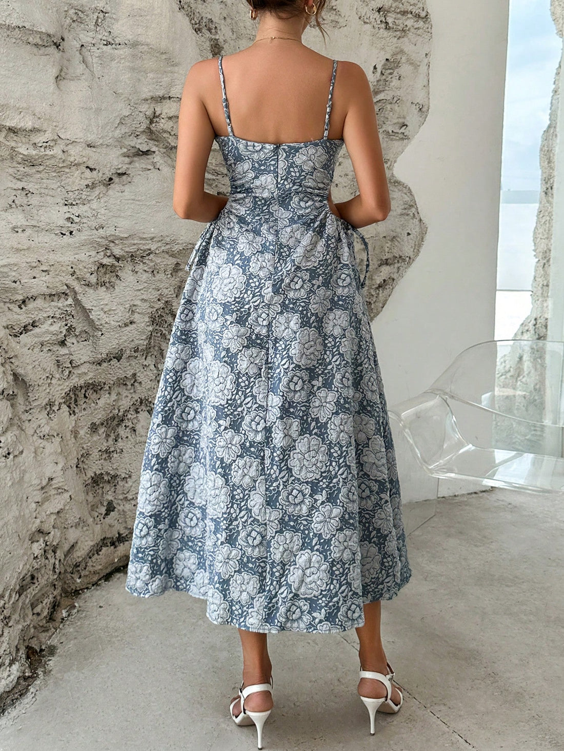 Turn heads in this chic Jacquard Cut-Out Backless Cami Dress in Lilac Purple. The stylish cut-out back adds a touch of playfulness to this elegant dress. Perfect for any occasion, this dress will make you feel confident and stylish. (Dress only, accessories not included).