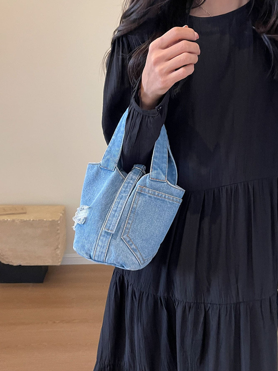 Introducing the Denim College Chic Tote Bag, the ultimate campus carry-all. Made from durable denim, this tote bag is perfect for carrying all your essentials in style. With spacious compartments and a chic design, it's the perfect accessory for any college student on the go.