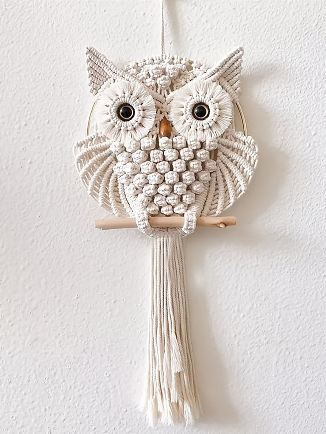 Enhance your home interiors with our stunning Mystical Owl Macrame Tapestry. Expertly handcrafted with intricate macrame details, this beautiful wall decoration adds a touch of mystique and charm to any room. Elevate your home decor with this unique and eye-catching piece.