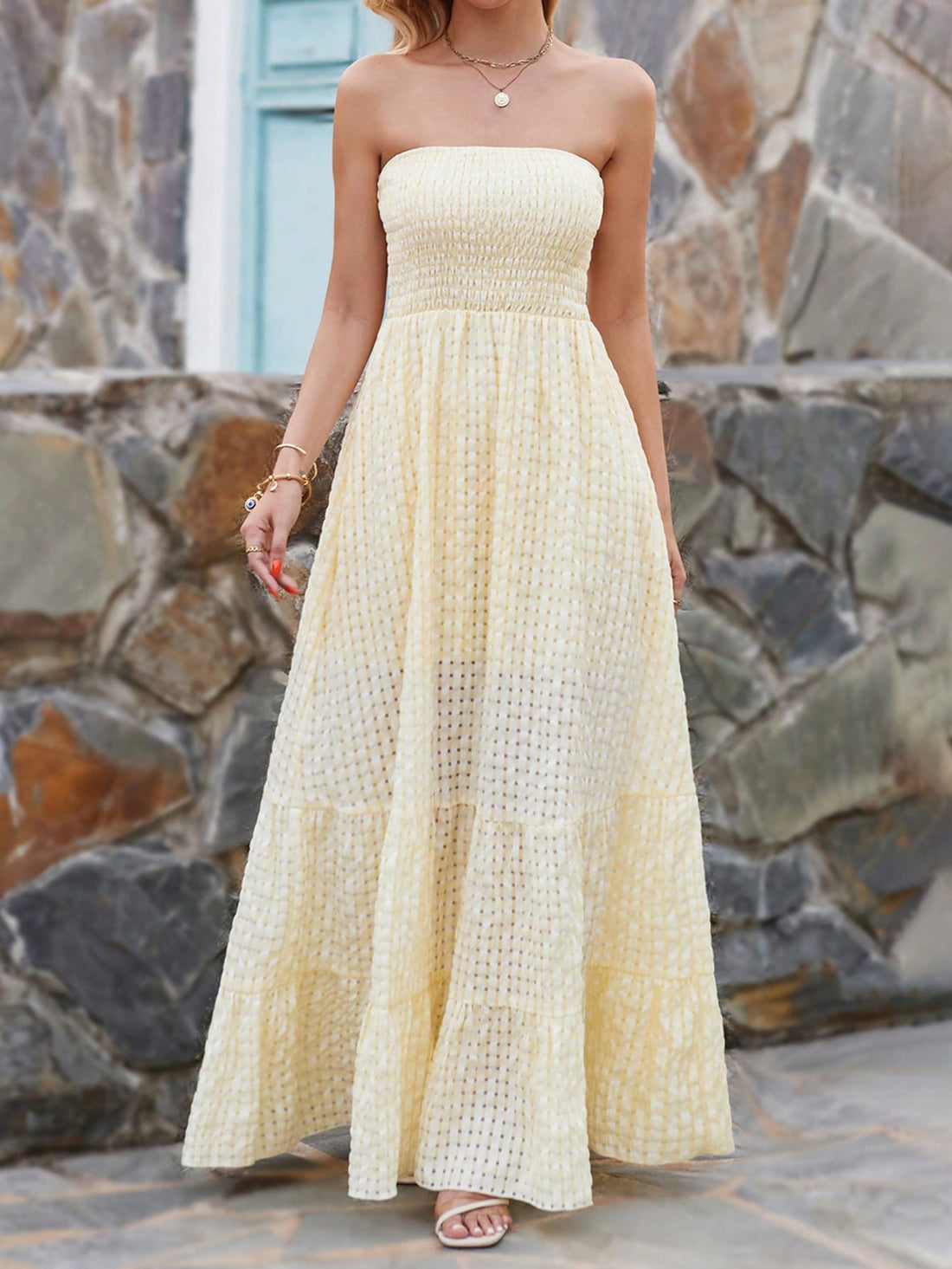 Effortless elegance for your perfect beach getaway! This ruffle hem tube maxi dress is your go-to for a sophisticated yet easygoing look. With its flowy silhouette and flattering fit, you'll feel both chic and comfortable while enjoying the sun and sand. No effort required - just effortless elegance!