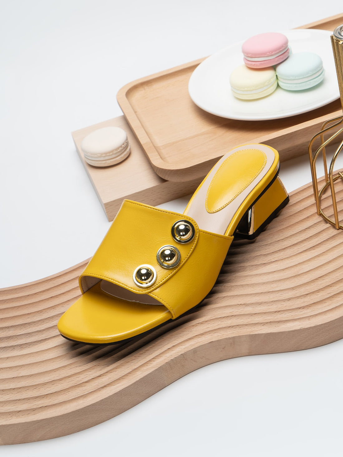 Step into sunshine with these Stylish Yellow Chunky Heel Mules, the perfect pop of color for your summer wardrobe. Their bold chunky heels offer comfort and confidence, making every stroll feel like a runway moment. Lightweight and lively, these mules are your go-to for sunny days and warm nights!