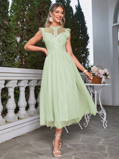 This chic and elegant bridesmaid dress features a contrast lace design and delicate ruffle trim for a touch of sophistication. Designed to flatter all body types, this dress is perfect for any wedding or special event. Stand out and feel confident in this stylish and timeless piece.