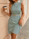 Elegant Sleeveless Mandarin Collar Dress with Full Print Details