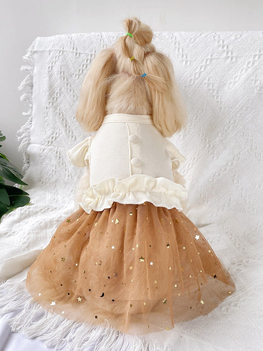 This Starry Sky Princess Pet Dress is a stylish and comfortable addition to your pet's wardrobe. Made of knitted fabric with puff sleeves and a mesh skirt, it features a unique khaki color and a beautiful starry sky design. Give your furry friend the royal treatment they deserve with this elegant dress.