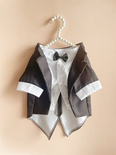 Dress your furry friend to impress with our Stripe Patterned Pet Tuxedo. Perfect for weddings and parties, this stylish outfit is sure to turn heads. Made with quality materials, your pet will be both comfortable and fashionable. Elevate your pet's style game with this must-have tuxedo.