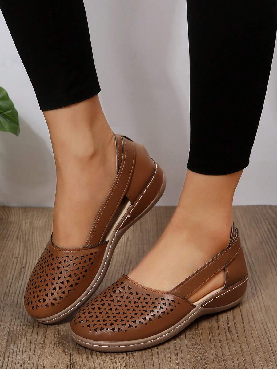 Step out in style and comfort with these Elegant Women’s Hollow-Out Slip-On Wedge Shoes. Their airy hollow-out design keeps your feet cool while the slip-on feature makes getting ready a breeze. Perfect for outdoor adventures or casual city strolls, the wedge heel adds a fun lift without sacrificing comfort. Make every step a playful statement!