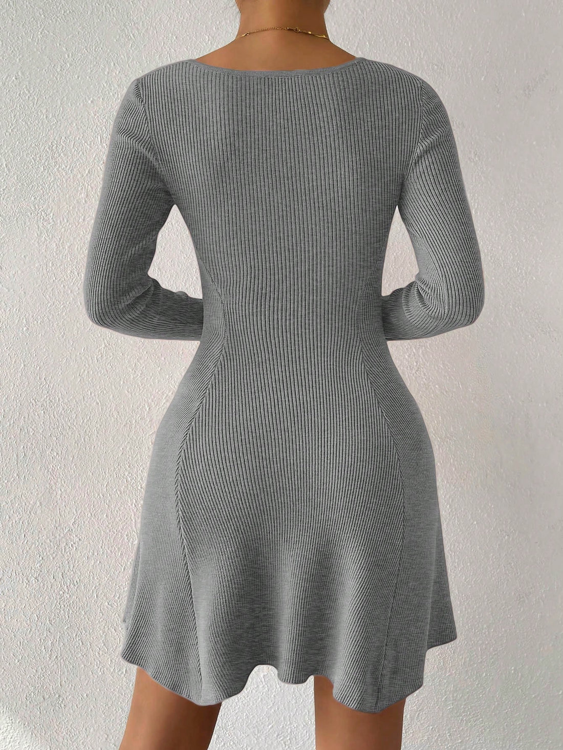 Effortlessly exude style in our Square Neck Ribbed Knit Sweater Dress. The stretchy ribbed knit fabric hugs your curves in all the right places. The square neckline adds a touch of sophistication while the sweater dress design keeps you warm and comfortable. Perfect for a day at the office or a night out.