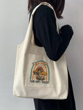 Our Whimsical Mushroom Cartoon Print Tote Bag is a fun and functional novelty gift that will add a pop of whimsy to any outfit. Made with durable materials, this tote bag is not only stylish but also functional for carrying everyday items. Its unique print is sure to make a statement and bring a smile to your face.