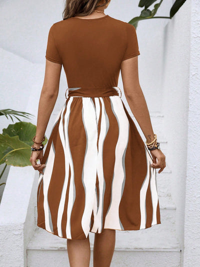 A Stylish Statement Piece with Geometric Graphic Print Belted Dress