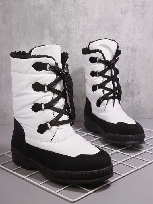 Black and White Faux Leather Lace-Up Lug Sole Boots: Stylish and Sturdy Footwear for Any Occasion