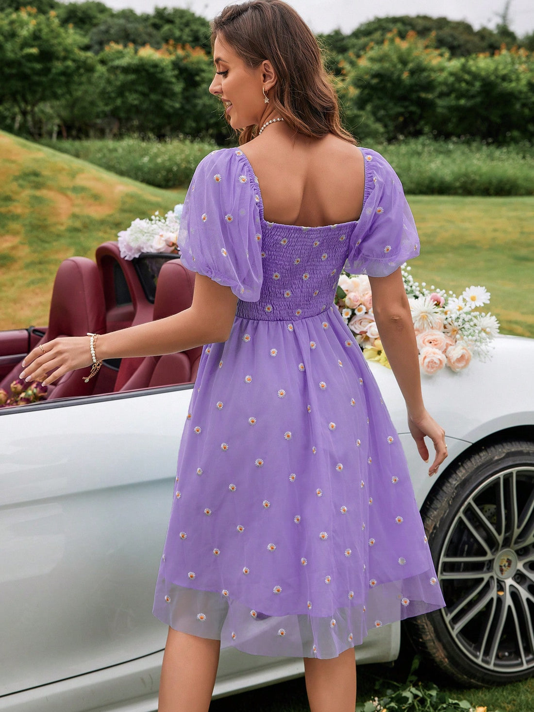 Discover effortless elegance with our Blooming Elegance dress. This square neck dress features small floral embroidery and puff sleeves for a delicate touch. The mesh overlay adds a touch of sophistication. Perfect for any occasion, this dress will elevate your style game.