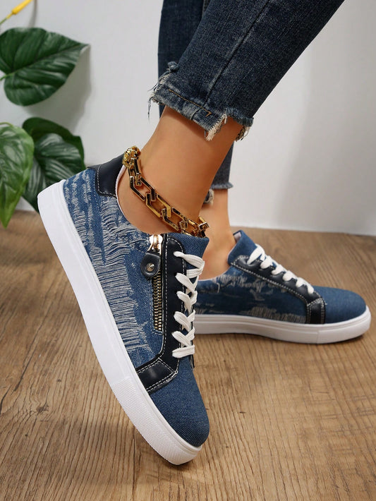 A must-have for sports and casual wear, our Stylish Denim Blue Canvas Sneakers combine fashion and function with their comfortable zipper design. These sneakers provide all-day breathability and support, making them perfect for any activity. Elevate your wardrobe with these stylish and versatile shoes.