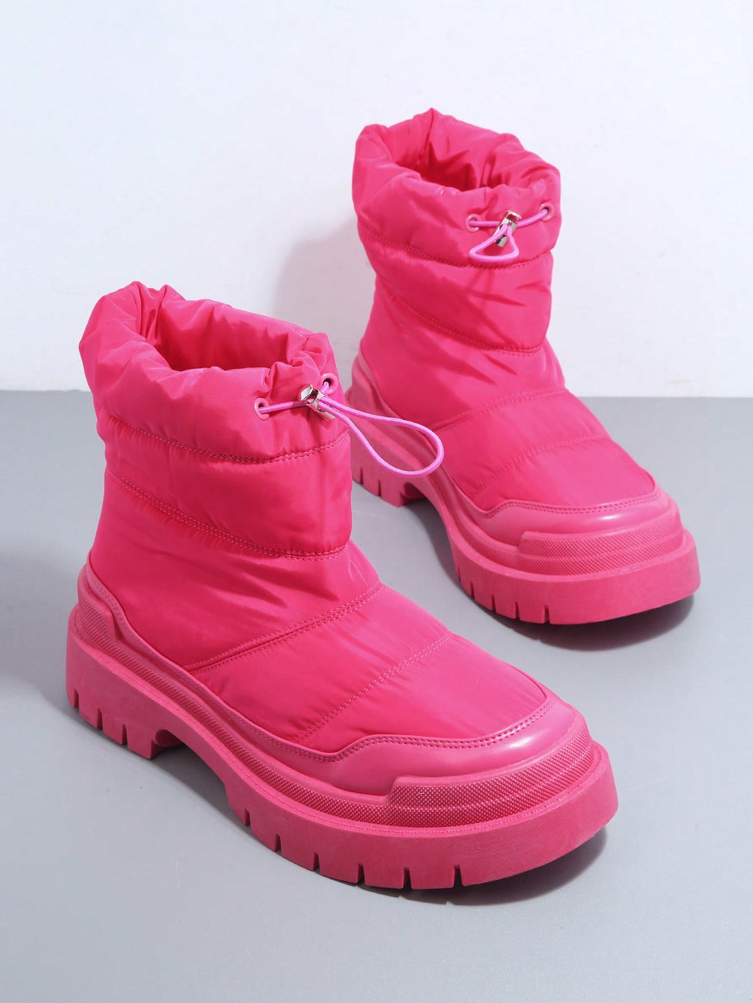 Experience both style and comfort with our Street Style Drawstring Lug Sole Boots. Perfect for any occasion, these boots are designed to keep you looking and feeling fabulous all day long. The drawstring feature adds a touch of uniqueness while the lug sole provides extra grip and support. Upgrade your footwear game now!