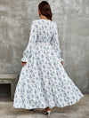 Vintage Vibes: Ditsy Floral Print Dress with Flounce Sleeve and Ruffle Hem