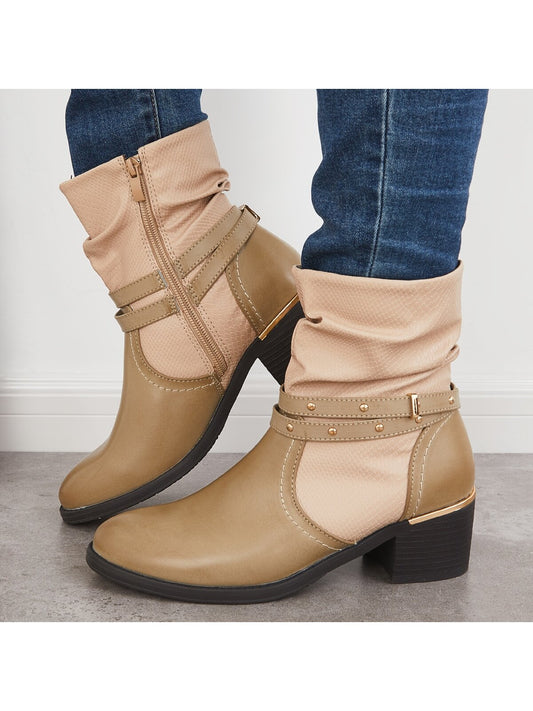 Indulge in vintage vibes with these Women's Retro Western Ankle <a href="https://canaryhouze.com/collections/women-boots?sort_by=created-descending" target="_blank" rel="noopener">Boots</a>. With a chunky low heel and cowboy boot design, you'll feel both stylish and comfortable. Perfect for any occasion, these booties are a must-have for any fashion-forward woman.