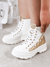 Unleash your style with Cammie Rhinestone Flame High Top Lug <a href="https://canaryhouze.com/collections/women-canvas-shoes?sort_by=created-descending" target="_blank" rel="noopener">Sneakers</a>. Featuring a fiery rhinestone flame design, these sneakers will elevate any outfit. With a bold lug sole for added grip and durability, step confidently in style.