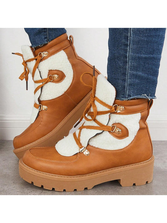 Discover the perfect blend of style and functionality with our Women's Waterproof Chunky Heel Combat Ankle <a href="https://canaryhouze.com/collections/women-boots?sort_by=created-descending" target="_blank" rel="noopener">Boots</a>. With a durable lug sole and chunky heel, these boots provide maximum traction and support. Stay dry and comfortable no matter the weather, making them an essential addition to your wardrobe.