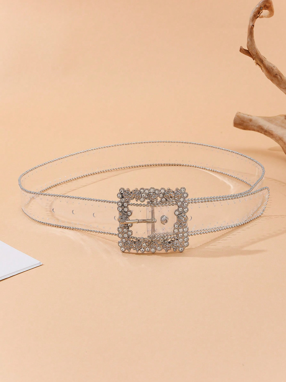 Elevate your style with our Glamourous Floral Buckle Rhinestone Belt. Featuring a stunning floral buckle with a beaded edge, this belt adds a touch of elegance to any outfit. And with the included puncher, you can achieve the perfect fit every time. Upgrade your accessory game now.