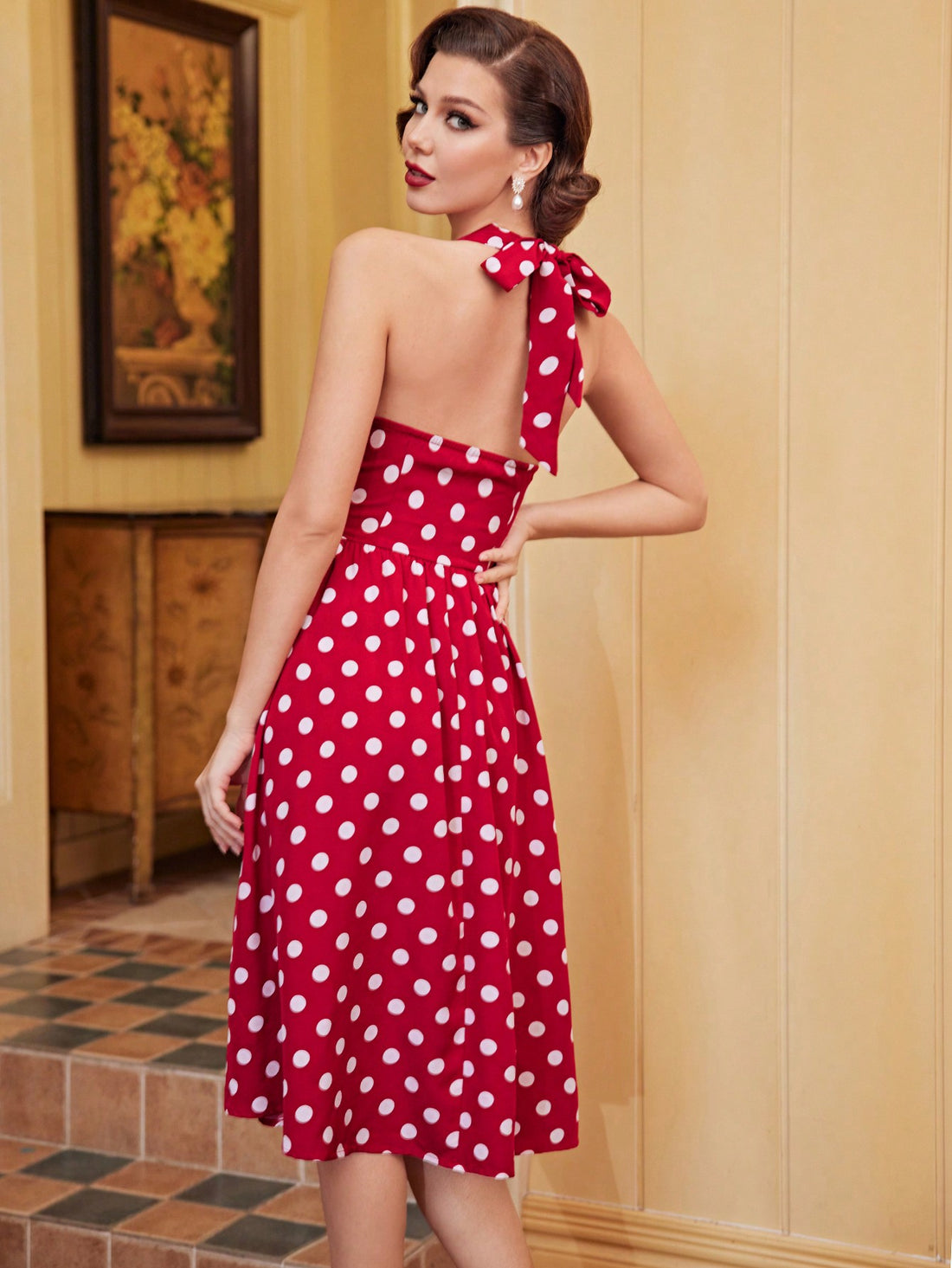 Turn heads in our Vintage Charm Dress – featuring a ruched front, playful polka dots, a halter neck, and a backless design. This summer dress adds charm and style to any occasion. (But don't just take our word for it, try it for yourself! 😉)