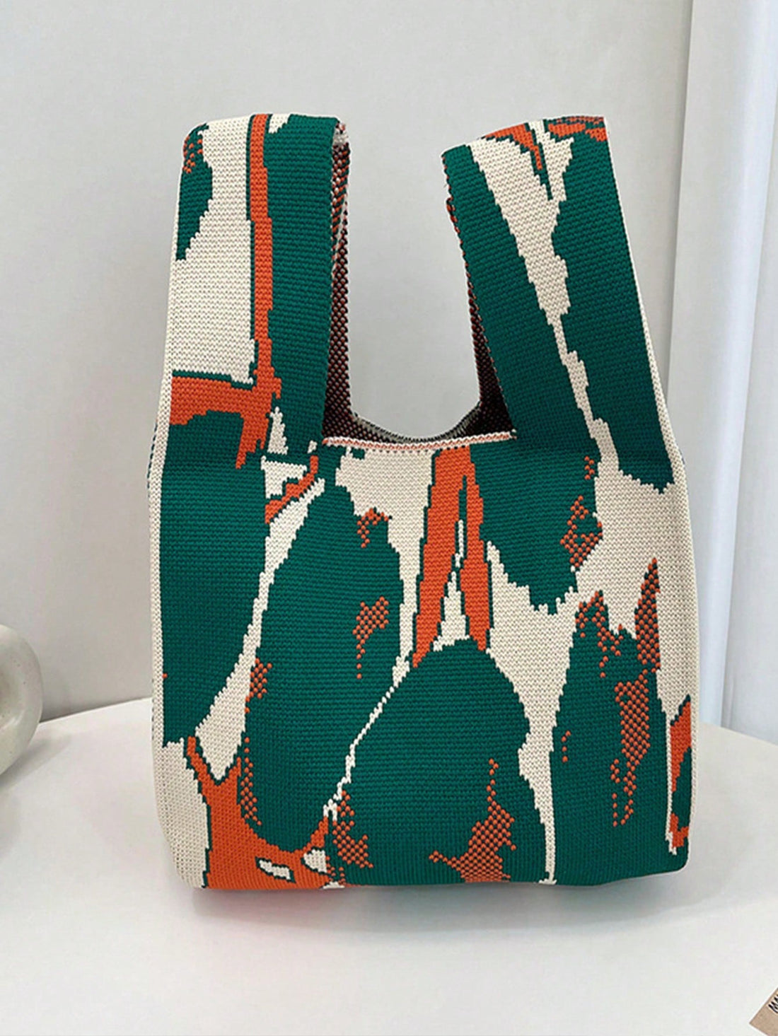 This Colorful Graffiti Ink Painting Umbrella Shoulder Bag is perfect for any occasion! With its vibrant design and spacious interior, it's the perfect companion for your daily errands or adventures. Keep your belongings organized and protected from the elements in style. With its durable construction, it's sure to be your go-to bag for years to come.