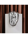 This Timeless Surrealism wall clock features a Salvador Dali style design, perfect for adding a touch of artistic flair to any home or office. The unique and eye-catching design showcases your appreciation for the surrealism movement and makes for a great gift for any art lover. Keep track of time while incorporating a touch of culture into your everyday life.