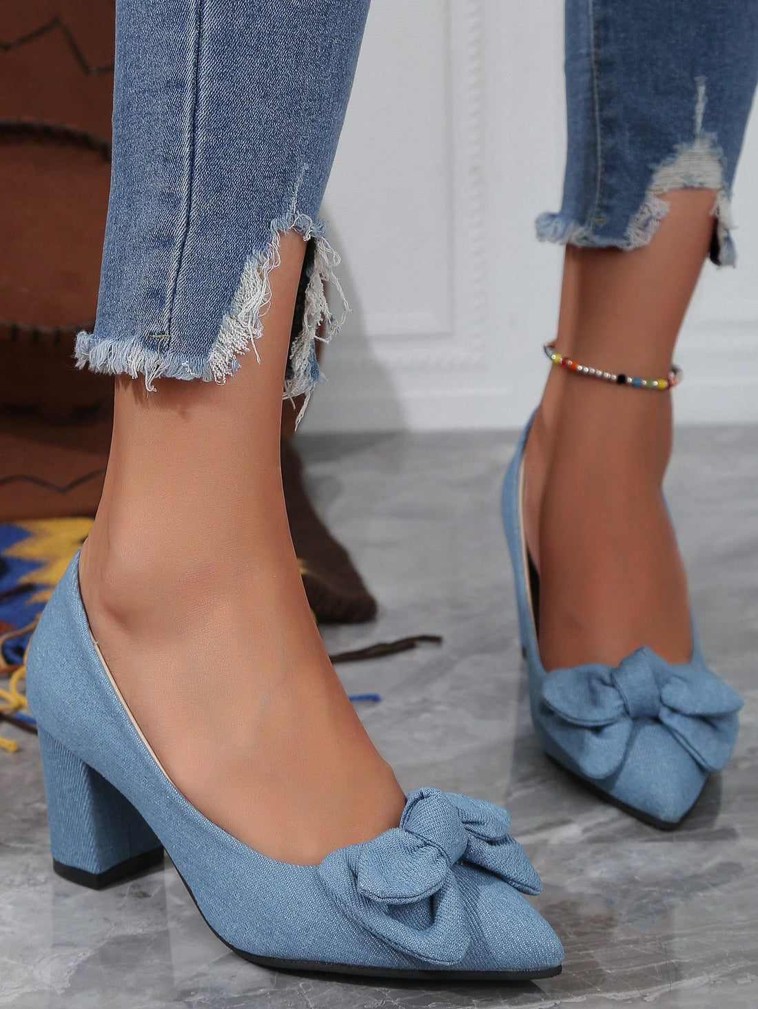 These trendy chunky heel pumps offer stylish comfort for every occasion. With a sleek design and sturdy heel, they provide both fashion and functionality. Perfect for adding a touch of sophistication to any outfit, these pumps are a must-have for any fashion-forward individual.