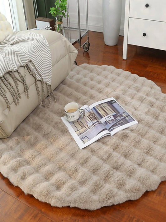This Soft and Fluffy Beige Bubble Velvet Round Carpet is the perfect addition to any living room, bedroom, or kid's <a href="https://canaryhouze.com/collections/rugs-and-mats?sort_by=created-descending" target="_blank" rel="noopener">room décor</a>. Made with high-quality materials, this simple solid color floor mat provides a soft and cozy feel, perfect for bay windows. Elevate your space with its luxurious texture and design.