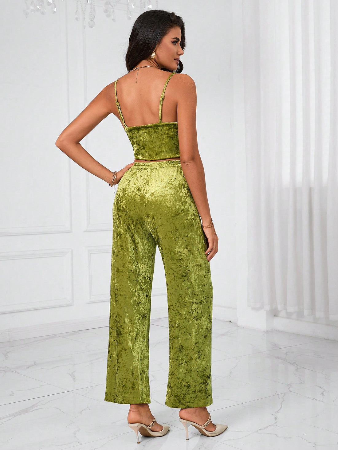 Slip into luxury with this velvet cami and wide-leg pants duo that's ready to turn heads. The silky-smooth cami drapes beautifully while the relaxed pants offer all-day comfort without sacrificing style. Whether you're dressing up for a night out or keeping it casual, this set brings that effortless elegance we all crave. Soft, sophisticated, and seriously fun to wear—your wardrobe just got a major upgrade!