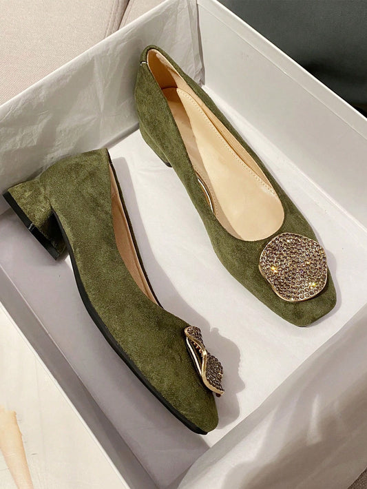 Add a touch of elegance with Golden Glamour: Classic Suede Flat <a href="https://canaryhouze.com/collections/women-canvas-shoes" target="_blank" rel="noopener">Shoes</a>. Made with high-quality suede and adorned with a stunning rhinestone buckle detail, these shoes bring timeless style to any outfit. The comfortable flat design is perfect for all-day wear. Elevate your look with Golden Glamour today!