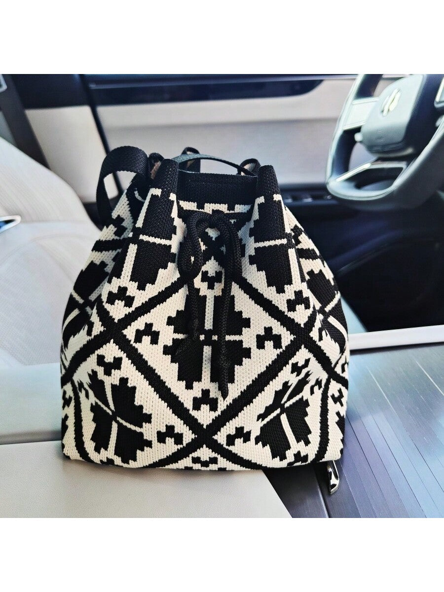 This Striped Fashion Knitted Bag is the ideal Mother's Day gift for storing your mom's essentials. The stylish design features a durable knit material and chic striped pattern, perfect for any occasion. Give your mom the gift of convenience and fashion with this versatile bag.
