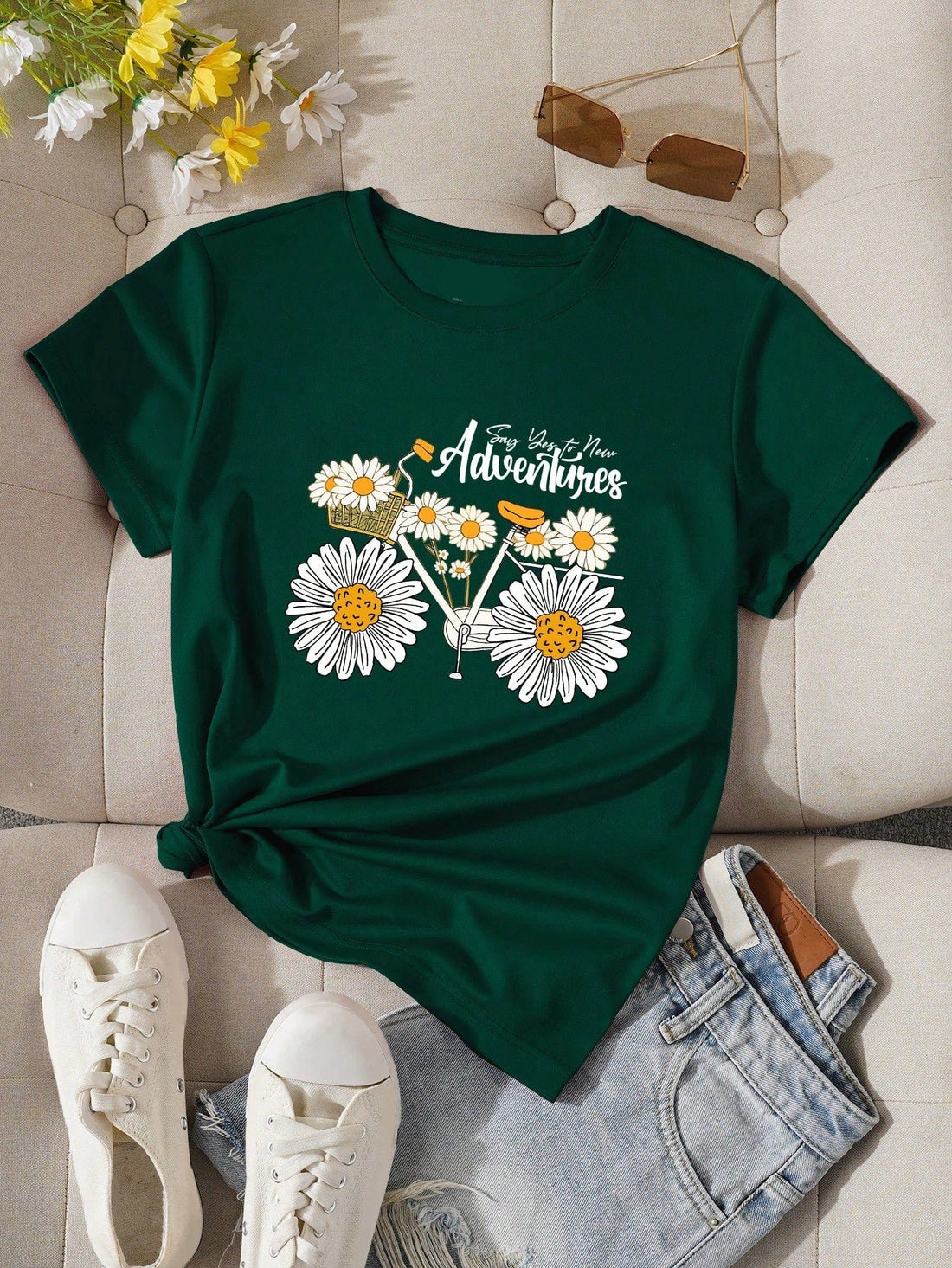 Introducing our Chic Daisy Flower Letter Printed T-Shirt, perfect for adding a touch of effortless style to your wardrobe. Made with high-quality materials, this t-shirt features a stylish daisy flower and letter print that will elevate any outfit. With its comfortable fit and chic design, you'll look and feel your best wherever you go.