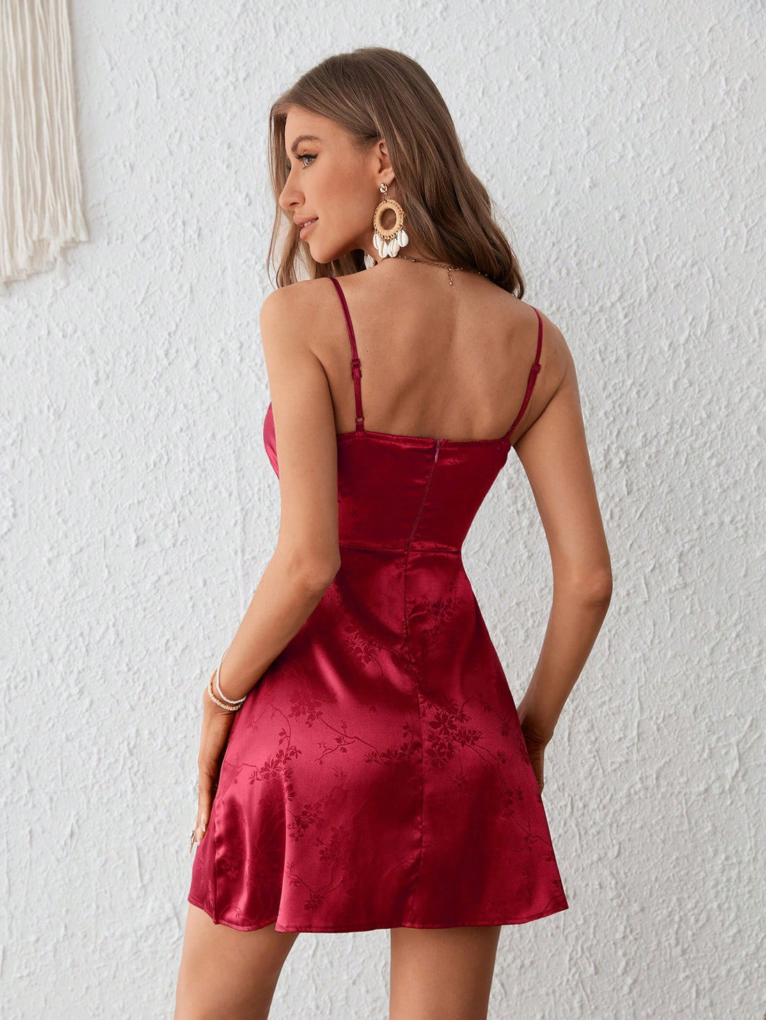 Elevate your style with our Chic Satin Cami Dress. The draped collar adds a touch of sophistication, while the jacquard detail adds subtle texture. Made with high-quality satin, this dress will make you look and feel confident for any occasion.