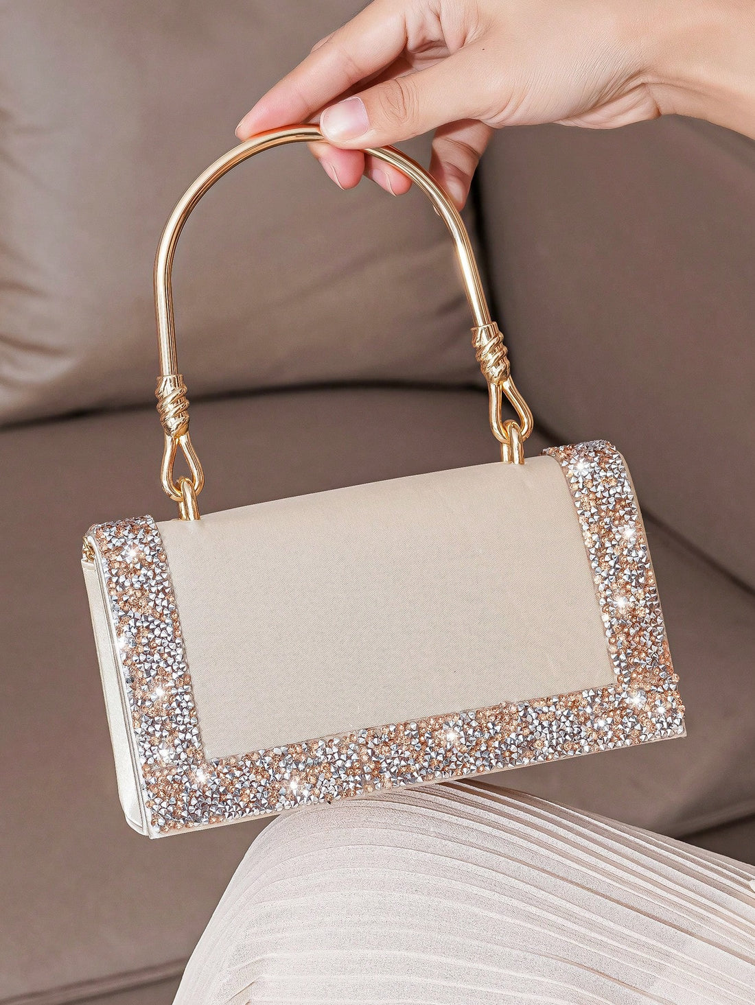 Add a glamorous touch to any party or wedding with our Elegant Rhinestone Clutch Bag. This stunning bag is designed with shimmering rhinestones and is perfect for any event. Elevate your style with this must-have accessory that will make you stand out from the crowd.