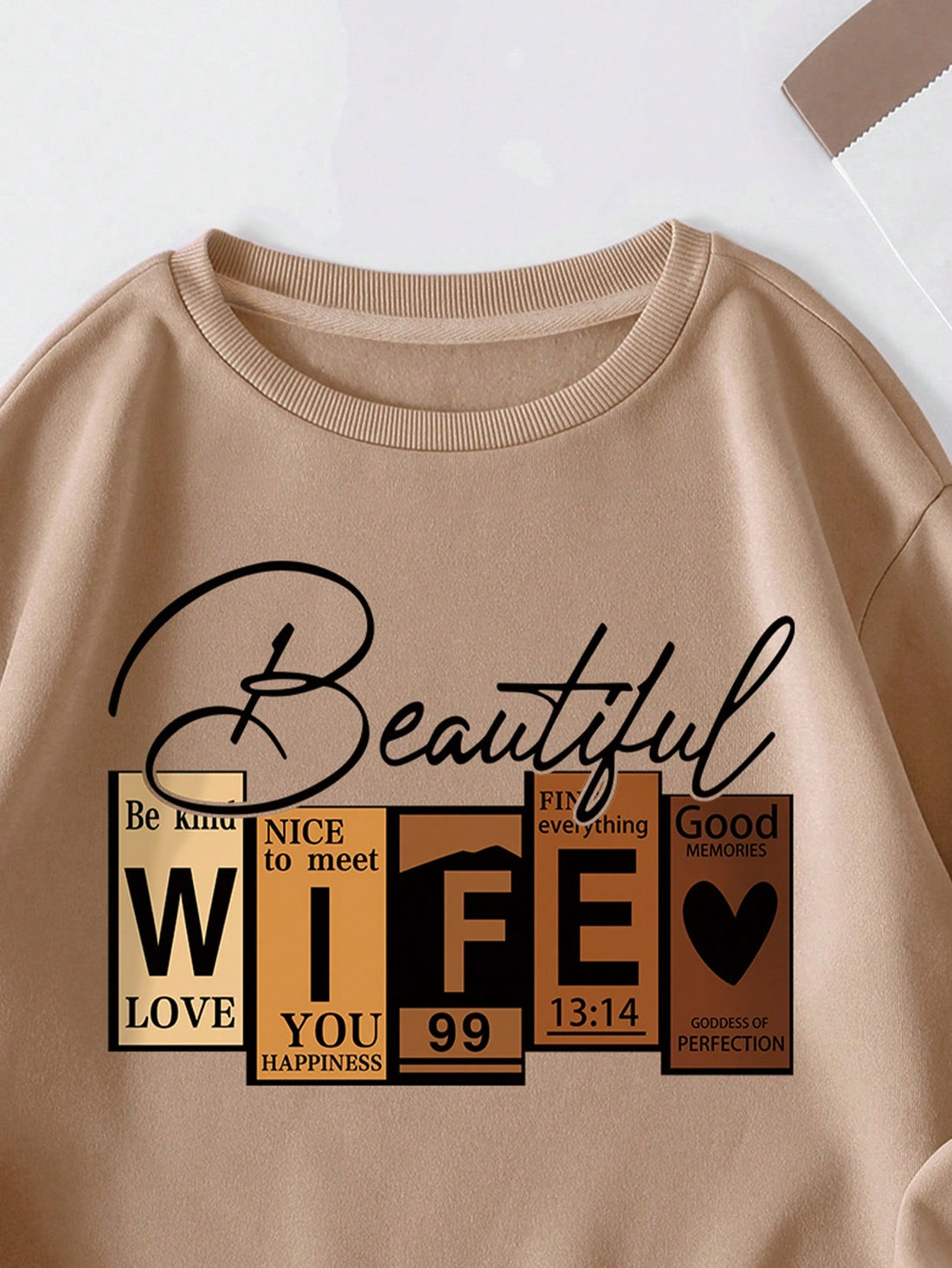 Stay warm and stylish with the Cozy & Trendy Thermal-Lined Sweatshirt. The thermal lining provides added warmth and the stylish letter graphic adds a trendy touch. Perfect for chilly days, this sweatshirt is comfortable and fashionable.