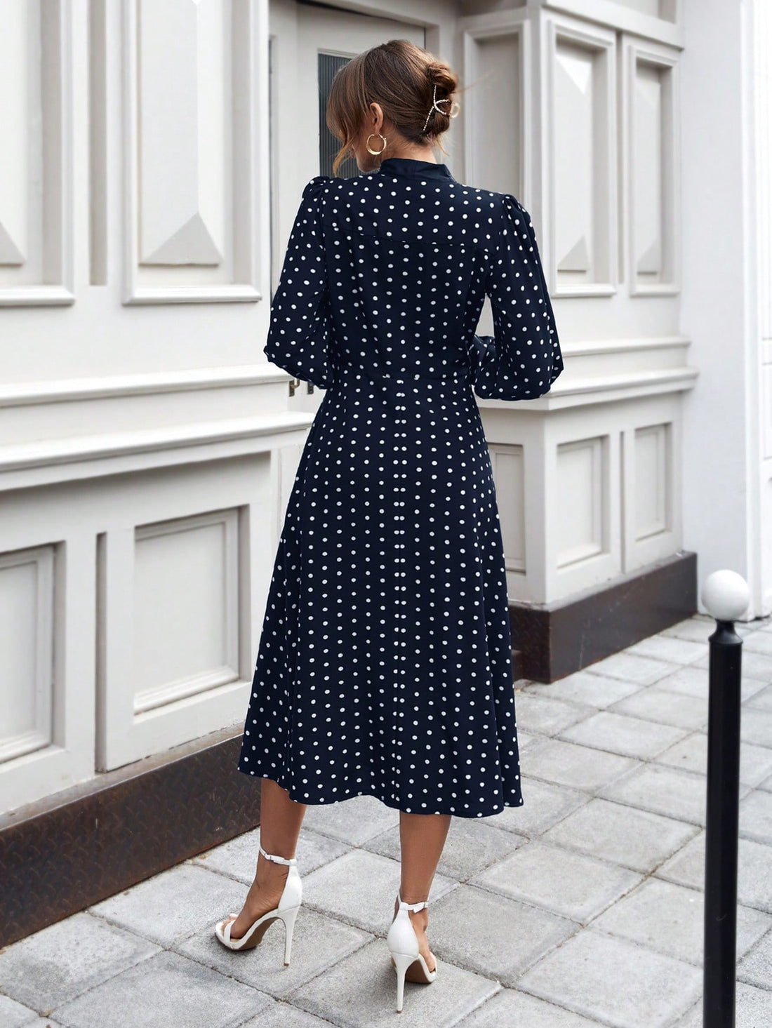 Unleash the chic Frenchy within with this stunning Polka Dot Tie-Neck A-Line Dress. Effortlessly stylish and oh-so-versatile, this dress will elevate your look in an instant. The tie-neck adds a touch of elegance while the A-line silhouette flatters every figure. Make a statement and exude confidence wherever you go!